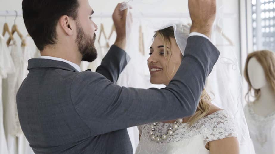 bride and groom in wedding dress prepare ceremony.